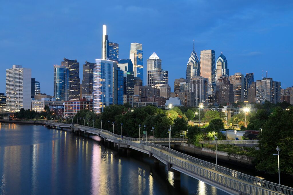Philadelphia skyline reflected on Schuylkill River at dusk, Pennsylvania, USA